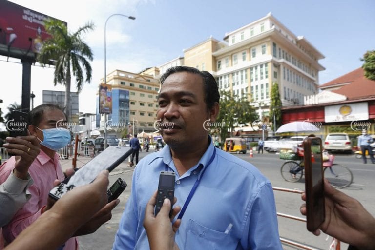 Defense lawyer Sam Sokong speaks to journalists after his clients’ trial at Phnom Penh Municipal Court on Wednesday. Panha Chhorpoan
