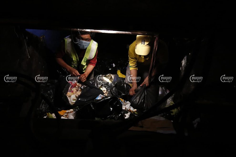 Waste management workers will be one of the first groups to receive a COVID-19 vaccine, along with medical workers, teachers and security personnel. Panha Chhorpoan