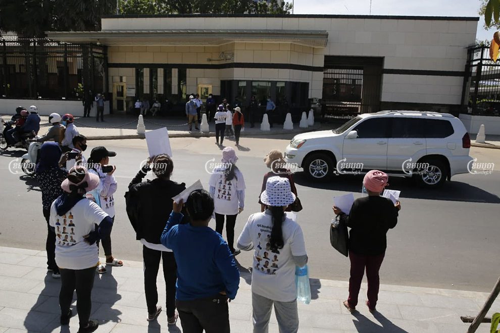 The "Friday Women" call for the U.S. Embassy in Phnom Penh to help secure the release from prison of their husbands, who are on trial for various charges related to incitement. Panha Chhorpoan