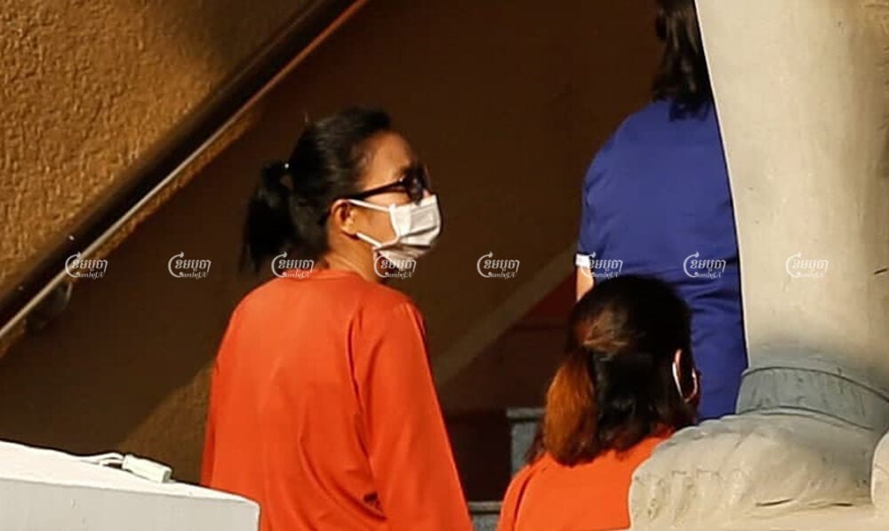 Youth activist Sar Kanika arrives at the Phnom Penh Municipal Court on January 15 to attend the start of an incitement trial involving her, Rong Chhun and Ton Nimol. Panha Chhorpoan