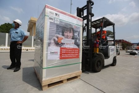 A consignment of 1.5 million doses of CoronaVac COVID-19 vaccine arrived in Phnom Penh on Friday. CamboJA/Pring Samrang