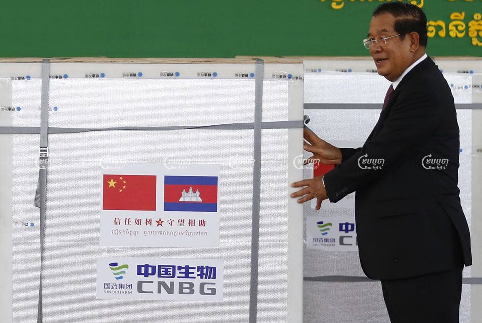 Prime Minister Hun Sen accepts the first consignment of the Chinese-made Sinopharm vaccine in Phnom Penh last month. CamboJA/Pring Samrang