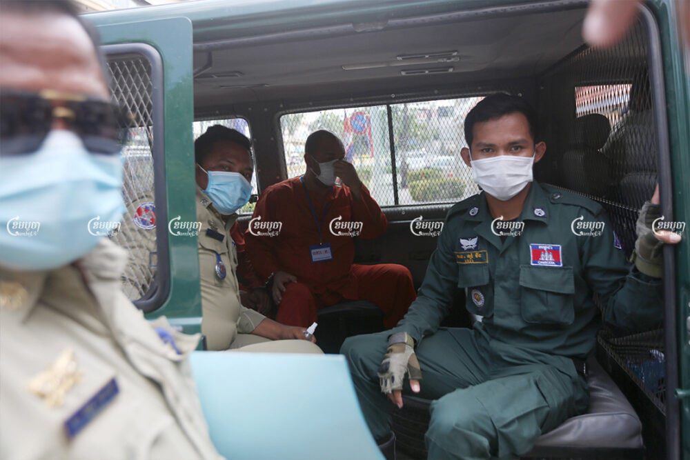 Former police general Ung Chanthuok arrives at Phnom Penh Municipal court ahead of his trial for breaching COVID lockdown guidelines, April 29, 2021. CamboJA/ Pring Samrang