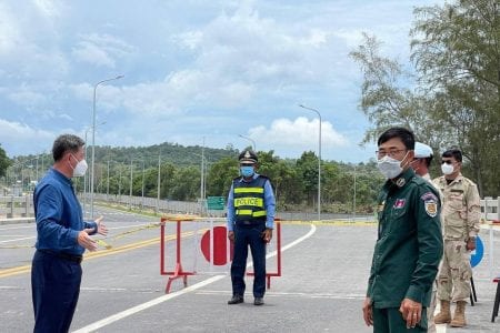 Kuoch Chamroeun, Preah Sihanouk provincial governor inspects barricades in Sihanoukville placed to prevent people from entering or leaving the locked down area, in a photo posted on the provincial administration’s Facebook page, April 23, 2021.