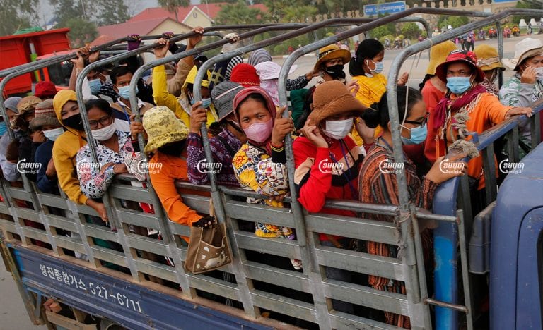 Garment workers leave a factory after finishing their work on the outskirts of Phnom Penh, May 6, 2021. CamboJA/ Panha Chhorpoan