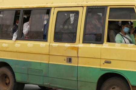 Garment workers travel to their factory in a crowded van ahead in Choam Chao1 commune, Pur Sen Chey district in Phnom Penh, June 10. CamboJA/ Pring Samrang