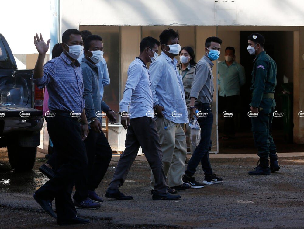 Journalists arrested for allegedly extorting an illegal cockfighting ring arrive at the Kandal Provincial Court for questioning, June 22, 2021. CamboJA/ Panha Chhorpoan