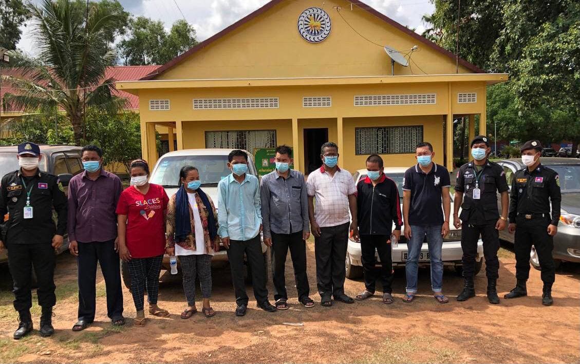 The journalists charged with extortion after taking photos in a private area of a timber warehouse late last week in Preah Vihear. Photo credited by The Association of Freedom for Cambodian Journalists