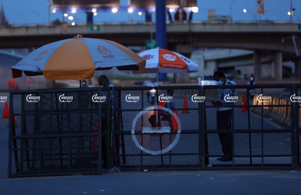 Police set up a barricade along a street during a lockdown in Phnom Penh, Picture taken on April 24, 2021. CamboJA/ Pring Samrang