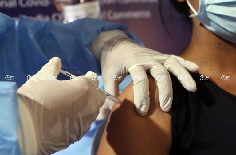 A woman receives a dose of the COVID-19 vaccine in Phnom Penh. Picture taken on April 1, 2021. CamboJA/ Pring Samrang