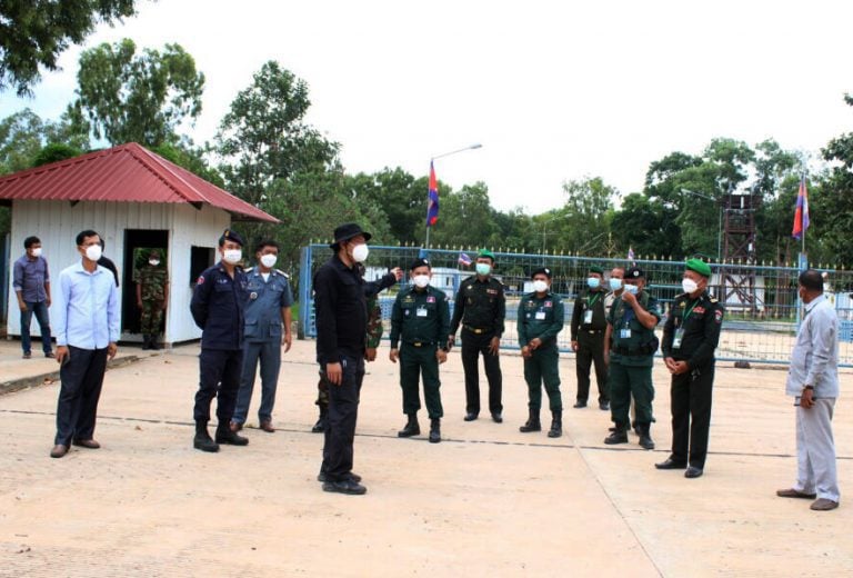 Oddar Meanchey provincial authorities inspect a closed Thai-Cambodian border checkpoint on July 30, 2021.