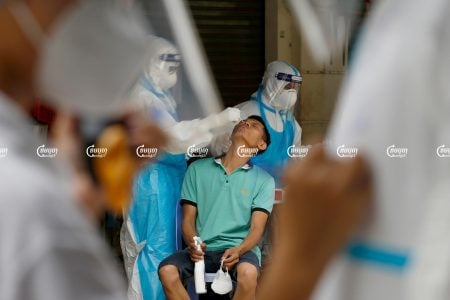 Health officials give Covid tests to residents in Phsar Touch village, Tuol Sangke 1 commune, Russei Keo district in Phnom Penh, which has recorded an outbreak of the Delta variant, August 2, 2021. CamboJA/ Panha Chhorpoan