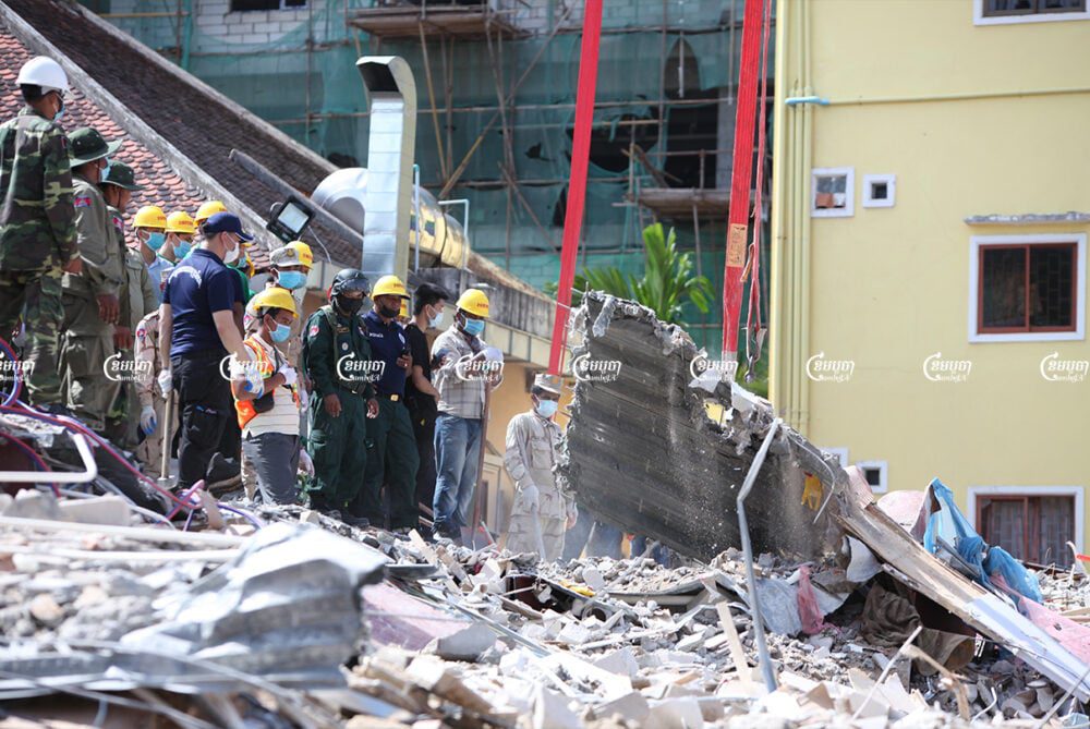 Rescue teams search for missing workers at the collapsed building in Sihanoukville in June 2019. CamoJA/ Panha Chhorpoan
