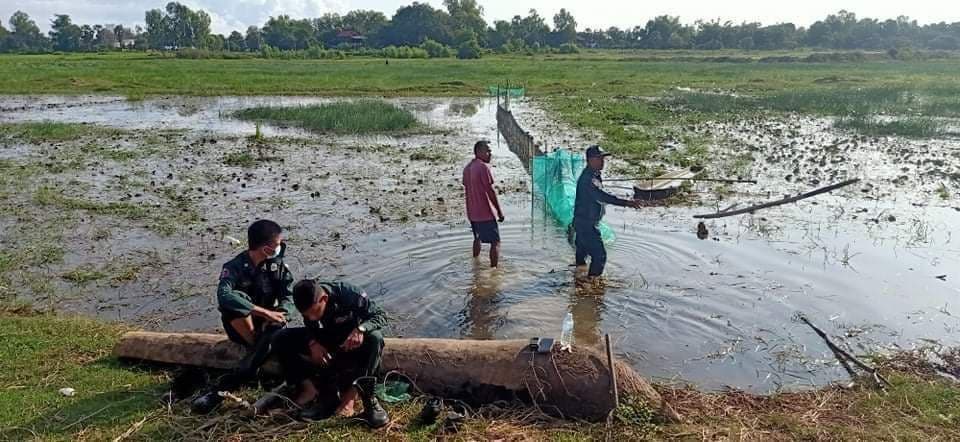 Local police remove illegal fishing nets in Boeng Pur in 2020. Supplied