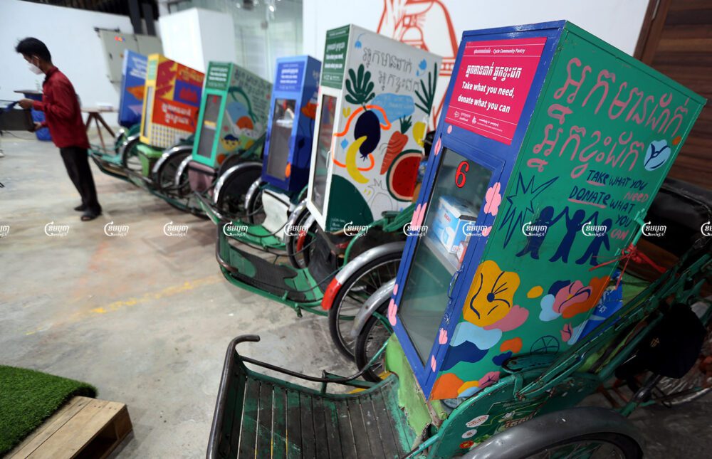 A cyclo driver and his vehicle at the cyclo pantry launch event in Phnom Penh, August 28, 2021. CamboJA/ Pring Samrang