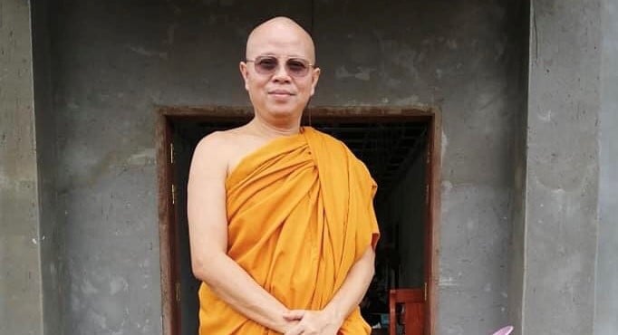 Reinstated monk Pang Soda stands in front of a monks' house in Kirivongkot Boreyserey Phnom Penh pagoda, in a photo posted on his Facebook page on August 25, 2021.