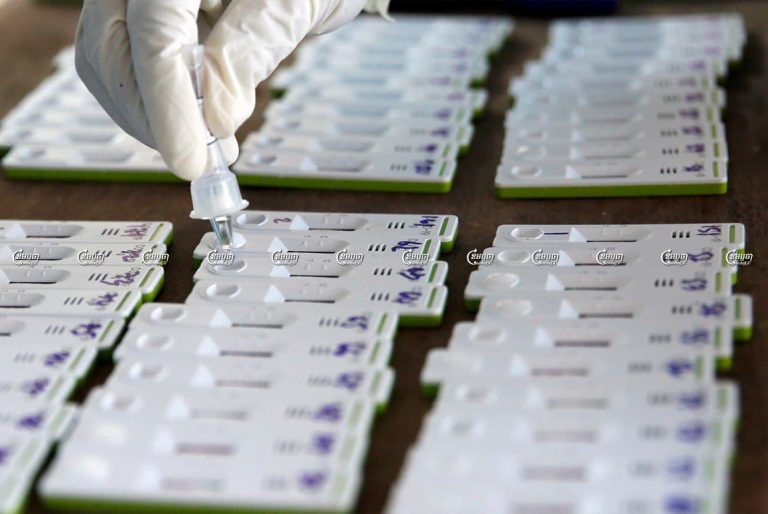 A health worker sets up a COVID-19 rapid test at a high school in Phnom Penh. Picture taken September 10, 2021. CamboJA/ Panha Chhorpoan