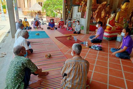 Health services organization officials meet at a pagoda with current and former tuberculosis patients, as well as others with contact with the disease, to form a community group to combat the disease. Photo taken on September 14, 2021. Photo Supplied