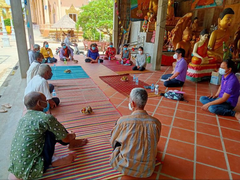Health services organization officials meet at a pagoda with current and former tuberculosis patients, as well as others with contact with the disease, to form a community group to combat the disease. Photo taken on September 14, 2021. Photo Supplied