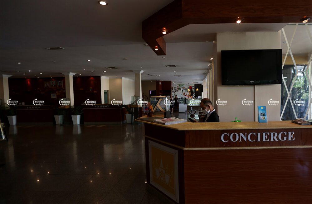 A staff works at a hotel in Phnom Penh, December 11, 2021. CamboJA/ Pring Samrang