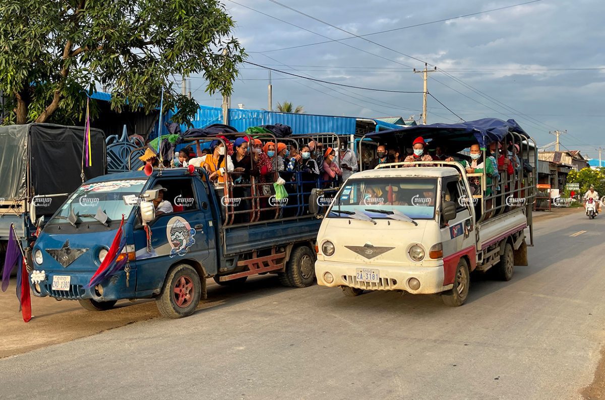 Garment workers travel on a truck in Kampong Speu’s Kong Pisei district. Picture taken on October 2, 2021. Cambodia/ Pring Samrang
