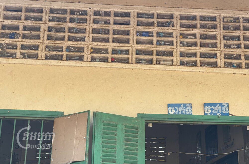 Plastic bottles and foam have been used in this classroom at Chrakcha Primary School to prevent the sugarcane dust from entering. Photo taken on January 18, 2022. CamboJA/ Khuon Narim.