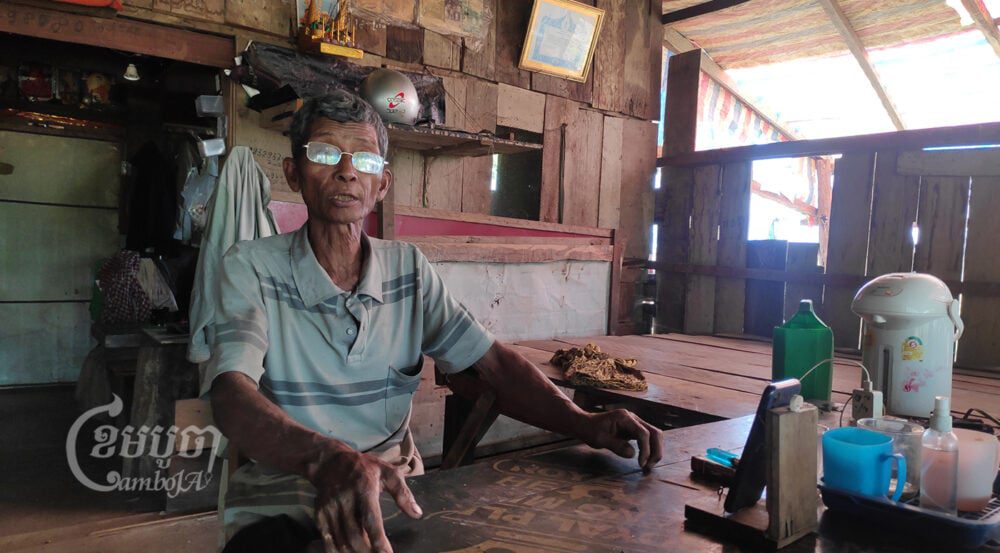 Community representative Tuy Chheng gives an interview to a CamboJA reporter in Rovieng district, Preah Vihear province. Photo taken on December 14, 2021. CamboJA / Vann Vichar