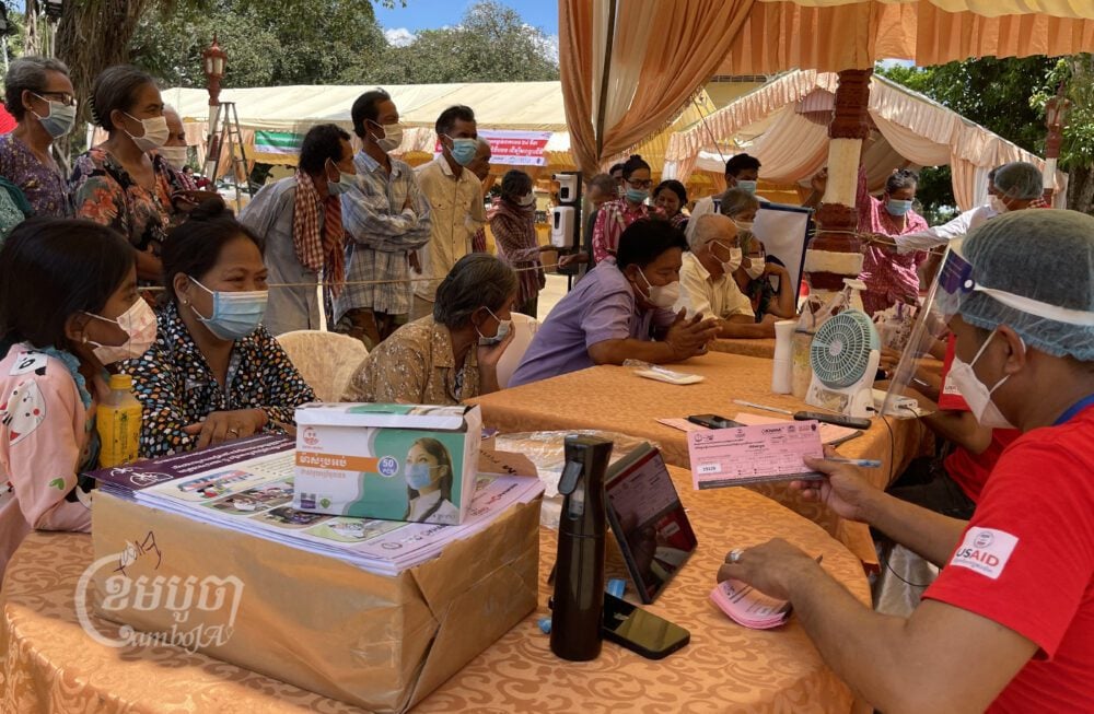 People register for TB tests at the World Tuberculosis Day event on March 24 in Ou Reang Euv district, Tboung Khmum province. Picture taken on March 24, 2022. The TB program is affected by the USAID funding cut. (CamboJA/ Khy Sovuthy)