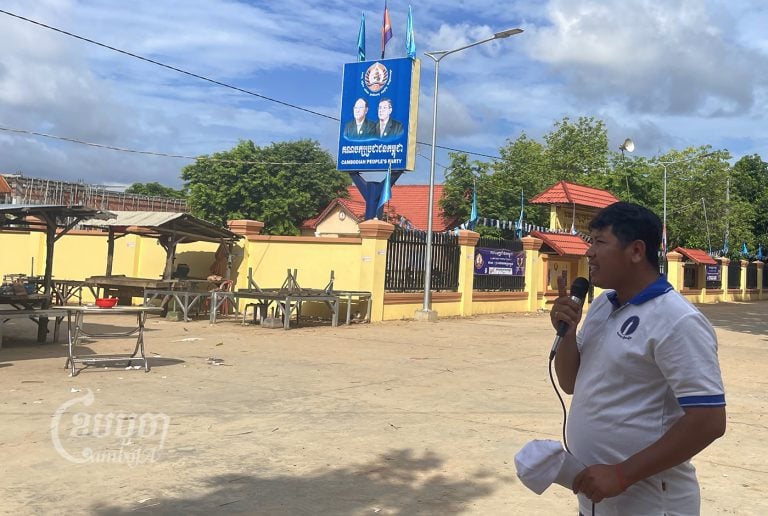 Former activist Kung Raiya, a commune chief candidate for the Candlelight Party, on the campaign trail in the Sdao commune of Kampong Cham province. Raiya was drumming up support on Sunday, May 29, 2022. CamboJA/ Khuon Narim