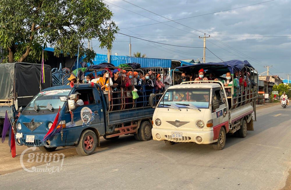 Garment workers travel on a truck in Kampong Speu’s Kong Pisey district. Picture taken on October 2, 2021. Cambodia/ Pring Samrang