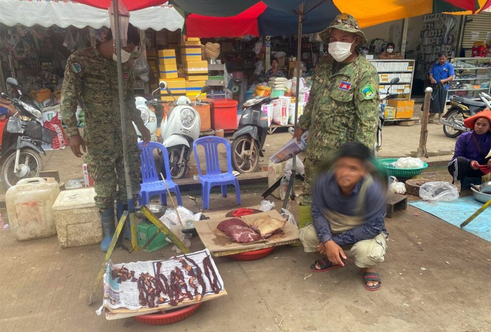 The working group of the Wildlife Sanctuary Office of Stung Treng Provincial Department of Environment cracks down on illegal wildlife trade in Stung Treng City, Samaki Market, Stung Treng Province, July 07, 2022. Sang Andy