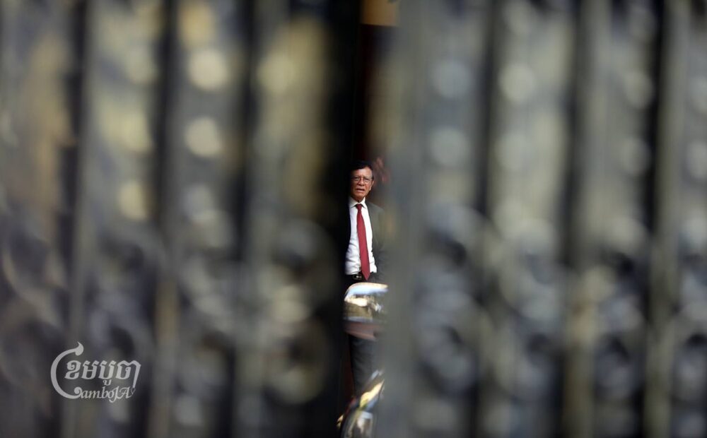 Kem Sokha, former president of the opposition Cambodia National Rescue Party, leaves his home in Tuol Kork district on March 3 to hear the announcement of the verdict in his three-year-long at the Phnom Penh Municipality Court. (CamboJA/Pring Samrang)