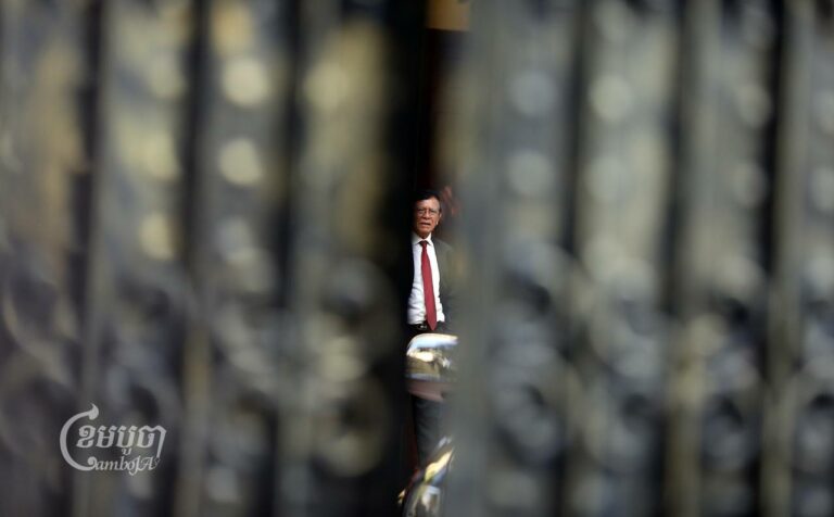 Kem Sokha, former president of the opposition Cambodia National Rescue Party, leaves his home in Tuol Kork district on March 3 to hear the announcement of the verdict in his three-year-long at the Phnom Penh Municipality Court. (CamboJA/Pring Samrang)
