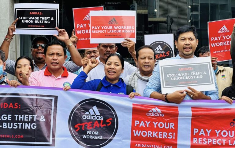 A group of union leaders gather in front of an Adidas shop in Phnom Penh seeking intervention to support workers suffering during Covid-19 restrictions and economic slowdown across the garment industry on May 11, 2023. (Union Leader Pav Sina’s Fcebook)