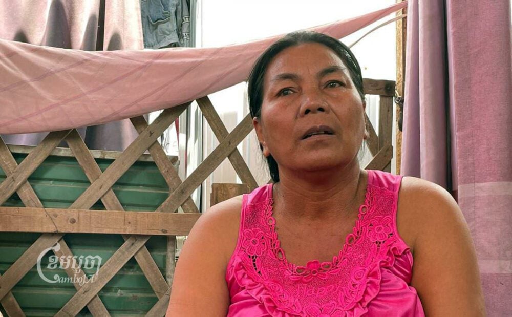 Am Phoeun, a Boeng Tamok resident, received a court summons on Monday. (CamboJA/Phon Sothyroth)