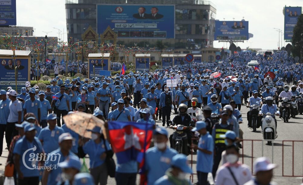 Members and supporters of the Cambodian People’s Party (CPP) gather at Koh Pich in Phnom Penh on July 1, 2023, to march on the first day of campaigning for the national elections. (CamboJA/ Pring Samrang)