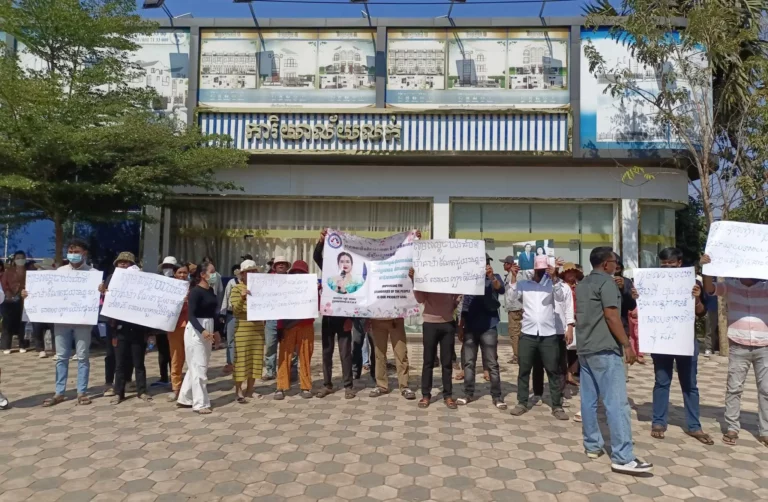 Residents hold banners demanding tycoon Leng Channa of Brilliant City refund them on February 12, 2024, as they fall into debt with banks. (Supplied)