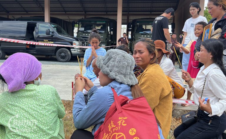 Family members of dead military officials cry during the funeral at Region 3 military base in Kampong Speu province on April 28, 2024. (CamboJA/Sovann Sreypich)
