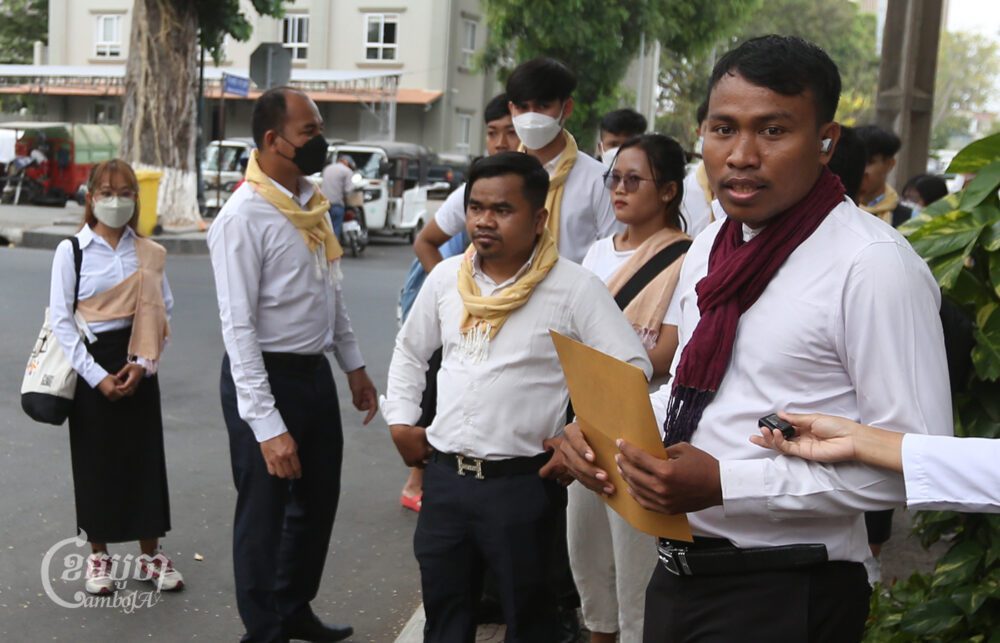 Keot Saray, president of Khmer Student Intelligent League Association pictured submitting a petition to the Royal Palace on March 29, 2023. (CamboJA / Pring Samrang)