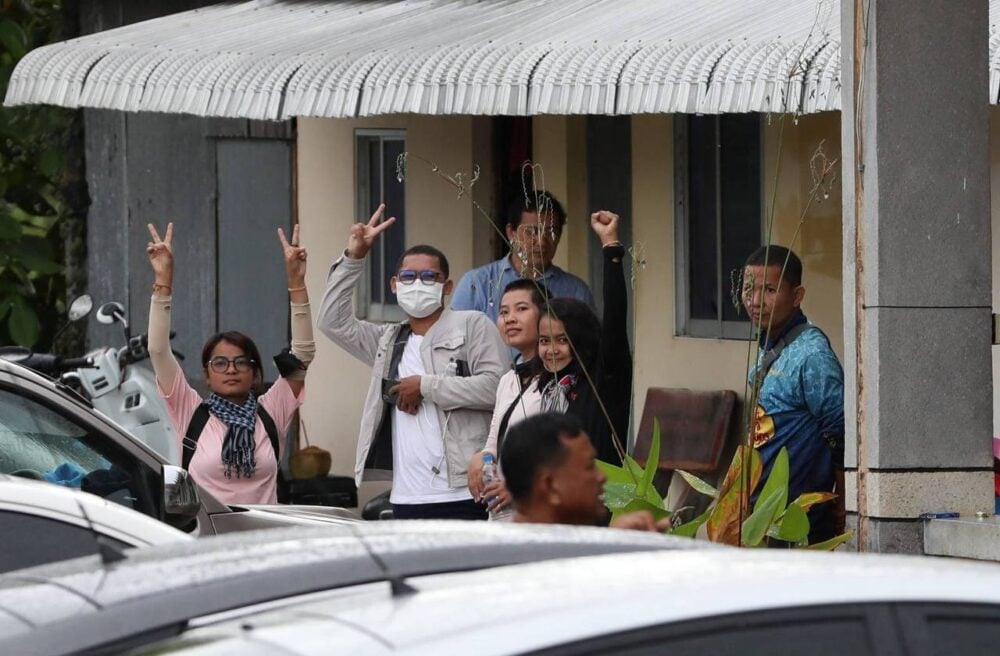 A picture showing Khmer Thavrak activists (from left), Sokun Tola, Svay Samnang, Chhoeun Daravy, Chhem Sreykea and Hun Vannak, outside the Bati district police station in Takeo province on August 16, 2022, the day four of them except Samnang were detained for questioning. (Licadho/Sok Raksmey)
