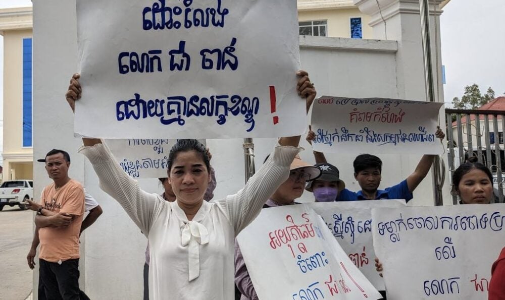 Yang Sophorn, president of CATU, and her members gather outside Kampong Speu provincial court on May 29, 2024. (CATU)