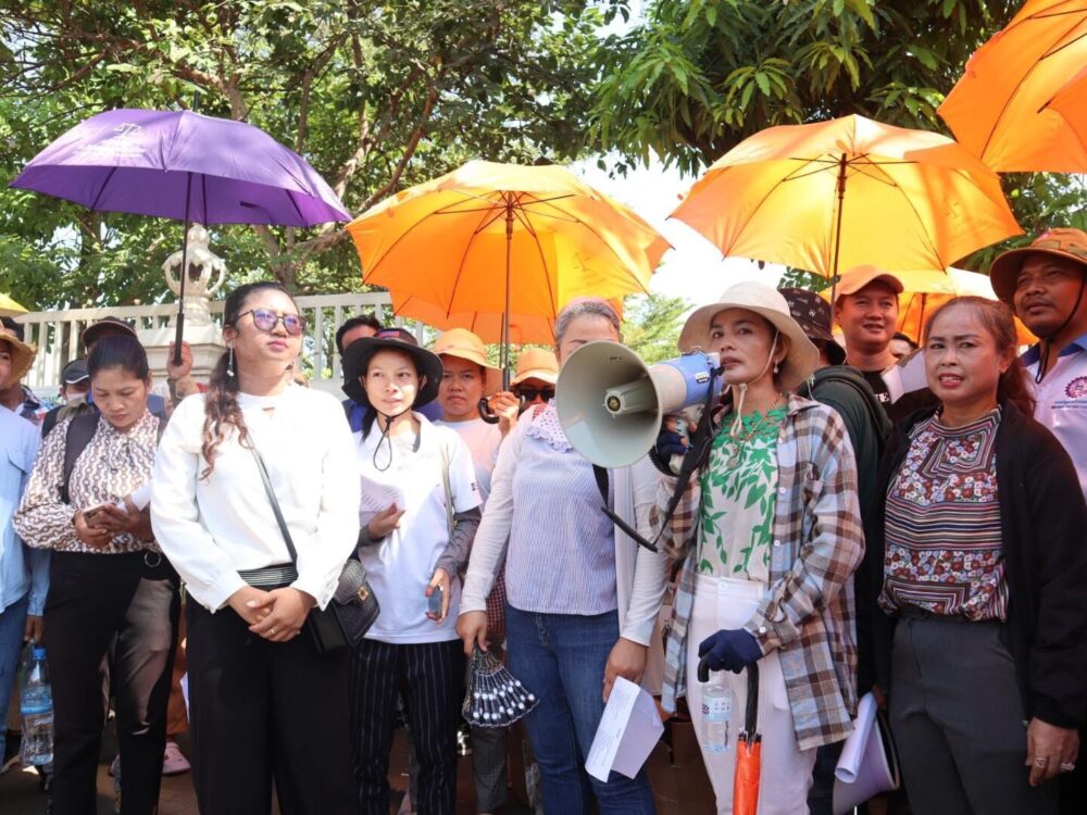 Roeun Kolap talks during a gathering outside the Ministry of Labor and Vocational Training where a petition was submitted on Labor Day on May 1, 2024. (FTUWKC)