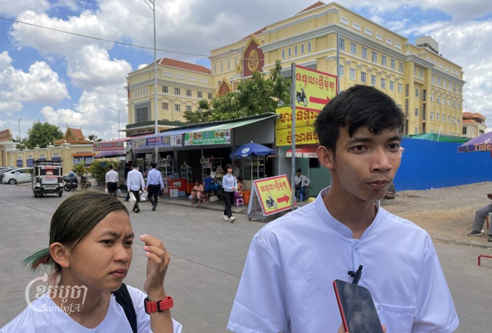 Environmental activists talk to journalists after their hearing on June 17, 2024. (CamboJA/Pring Samrang)
