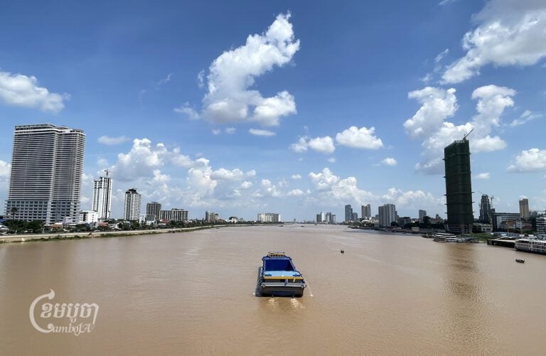 A barge crosses the Tonle Sap River on August 22, 2024. (CamboJA/Pring Samrang)