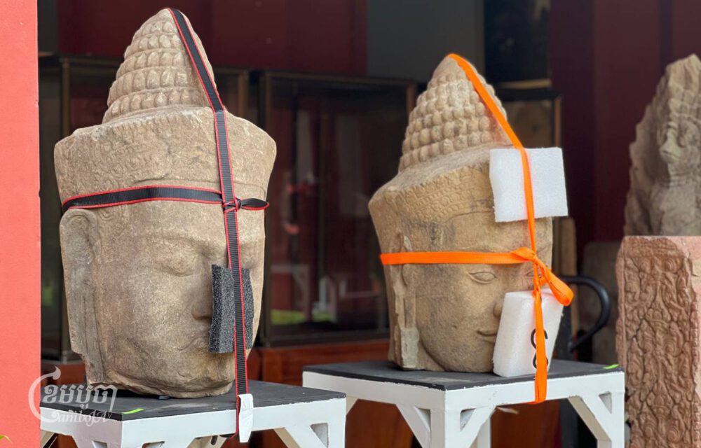 Two “Guardian God” heads from the late Angkor period, recently repatriated from the U.S. in August, are now stored at the National Museum of Cambodia. Photo taken on September 5, 2024. (CamboJA/Ly Rosslan)