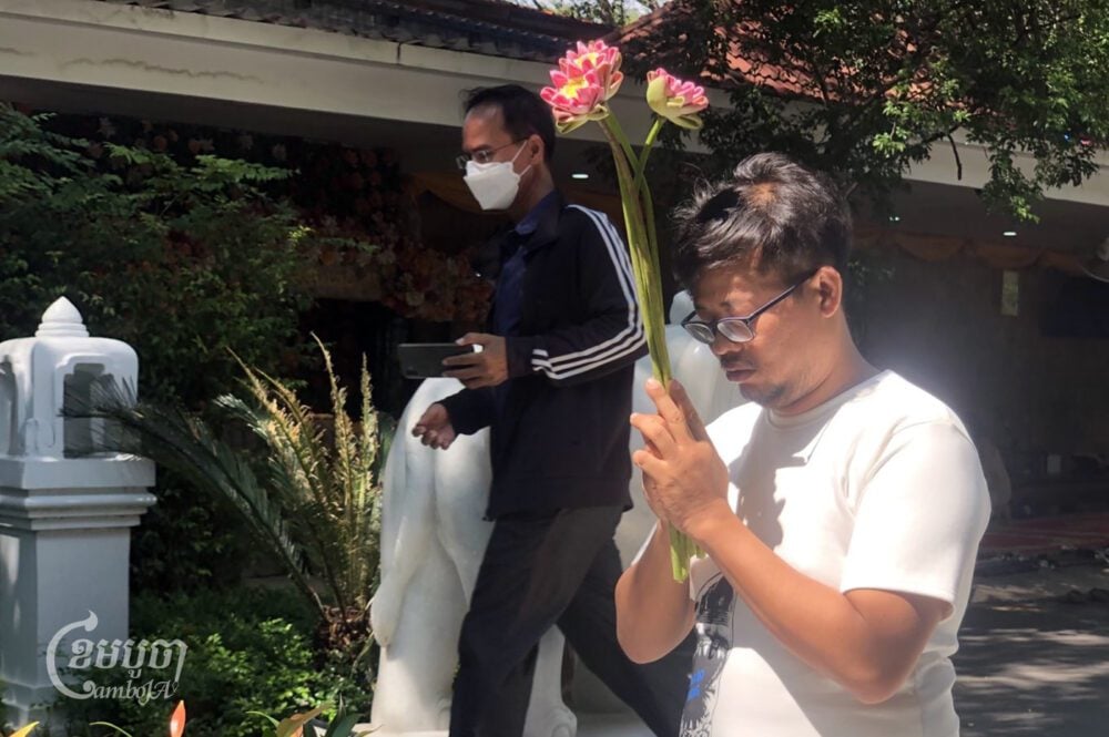 Mech Dara prays and seeks blessing for good luck at a pagoda after he was released on bail on October 24, 2024. (CamboJA/Seoung Nimol)