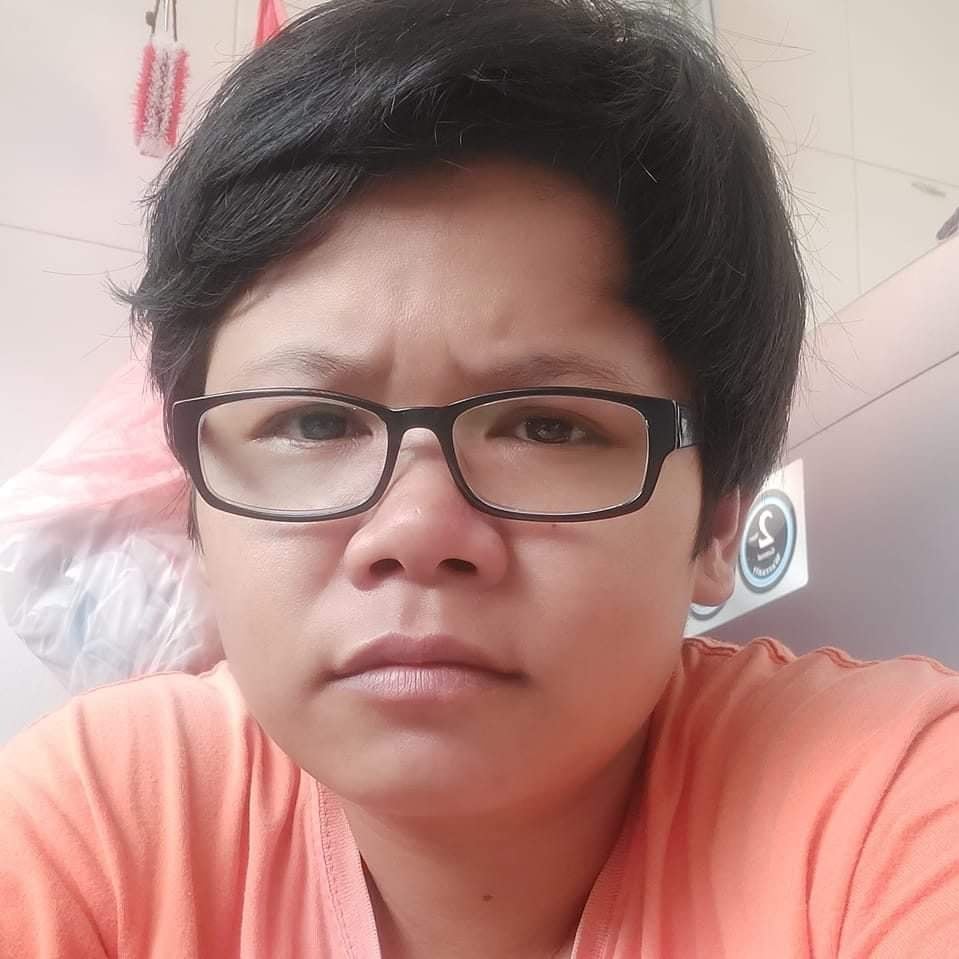 Nuon Teoun, a Cambodian woman who worked as a maid in Malaysia for several years before being deported to Cambodia, is shown in a photo she posted on Facebook.