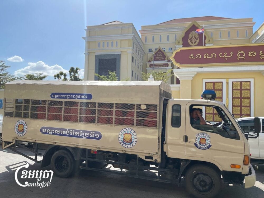 Police truck transports prisoners including Morm Rithy to Phnom Penh Municipal Court for hearing on November 27, 2024. (CamboJA/Pring Samrang)