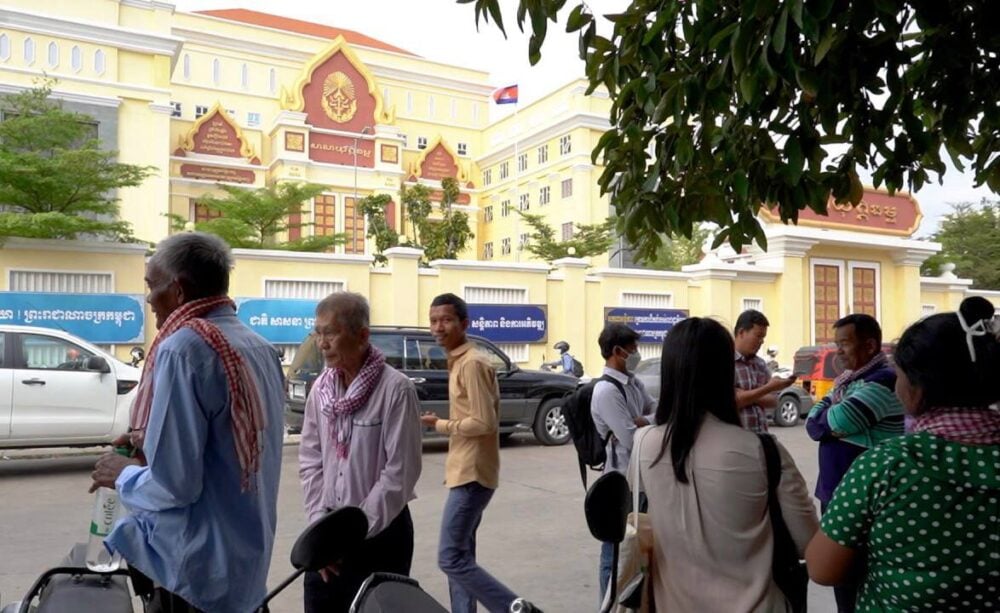 Relatives and friends gather in front of Phnom Penh Municipal Court which heard the incitement more than 30 activities on December 24, 2024. (CamboJA/Hel Komsan)