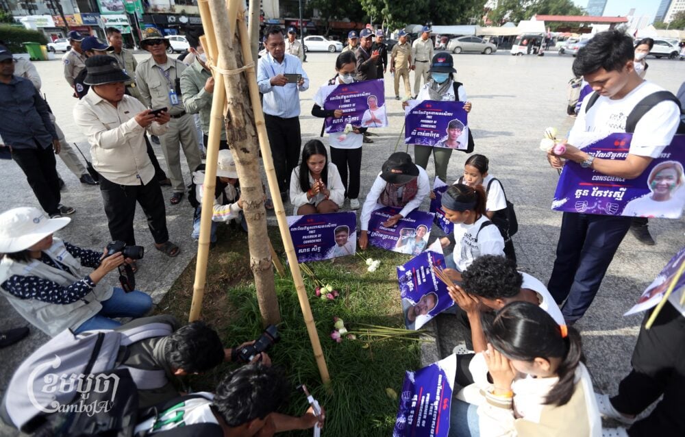 Family members and supporters of jailed activists gather to pray at the Tonle Sap riverbank while marking Human Rights Day in Phnom Penh on December 10, 2024. (CamboJA/Pring Samrang)